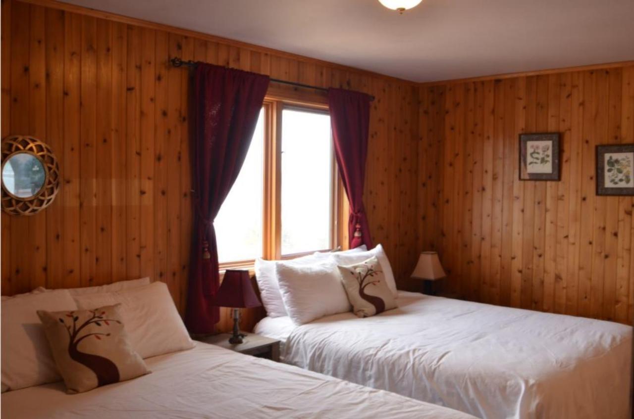 Knotty Pine Cottages, Suites & Motel Rooms Ingonish Eksteriør bilde